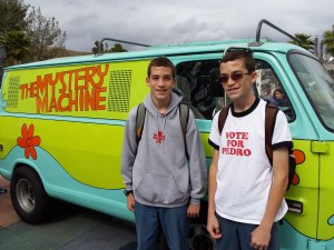 Joshua (left) and Jacob in front of the Scooby Doo Mystery Machine at Universal Studios.