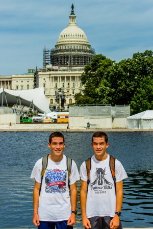 Joshua (left) and Jacob pose in front of the U.S. Capitol building.